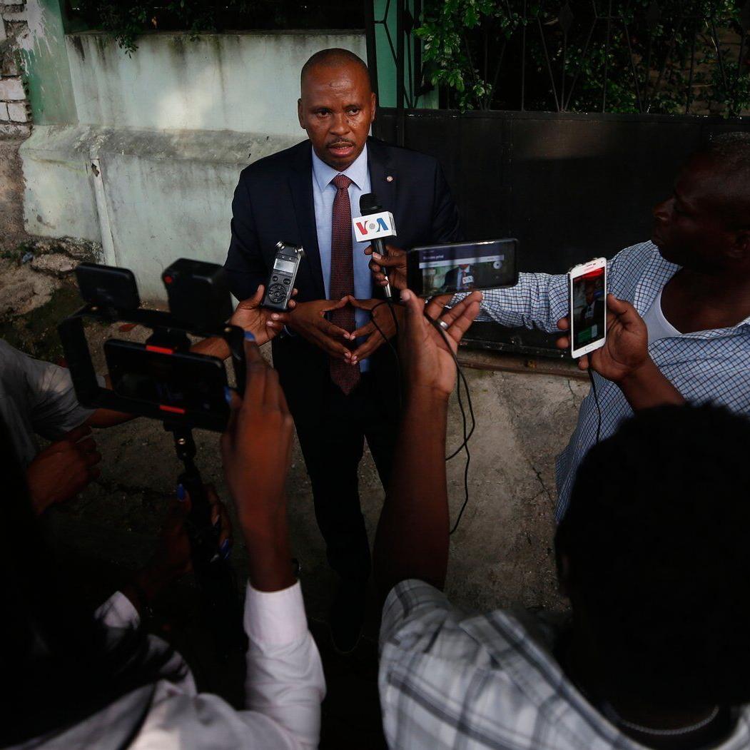 Haitian police arrest a former senator accused of working with gangs to attack a peaceful community